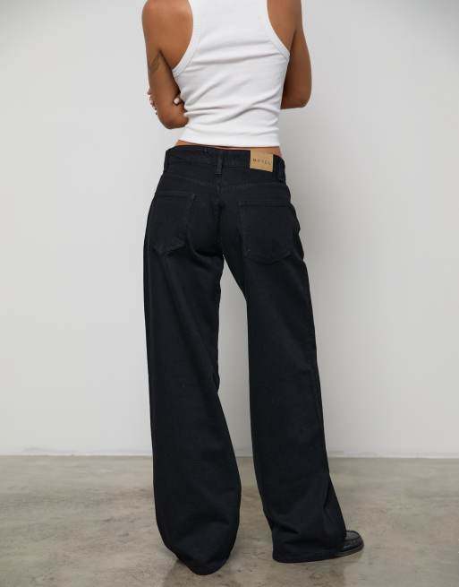 Motel - Ruimvallende jeans met lage taille in zwart met spoeling, 2 van 4