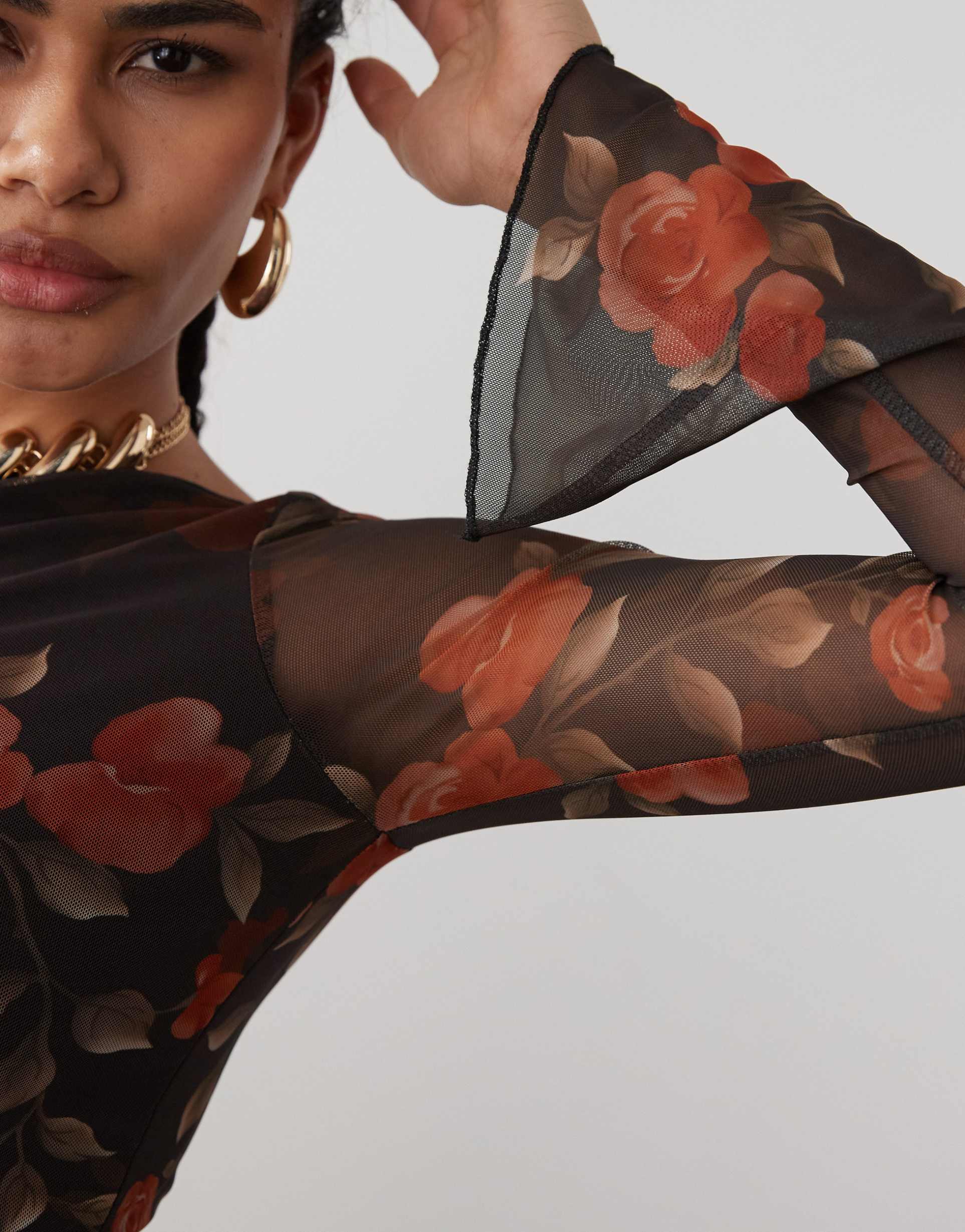 motel sevila long sleeve watercolor rose mini dress in black