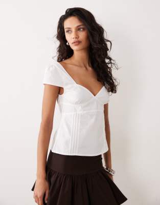 Motel - Uliva - Korsett-Oberteil aus Popeline in Weiß mit Flügelärmeln