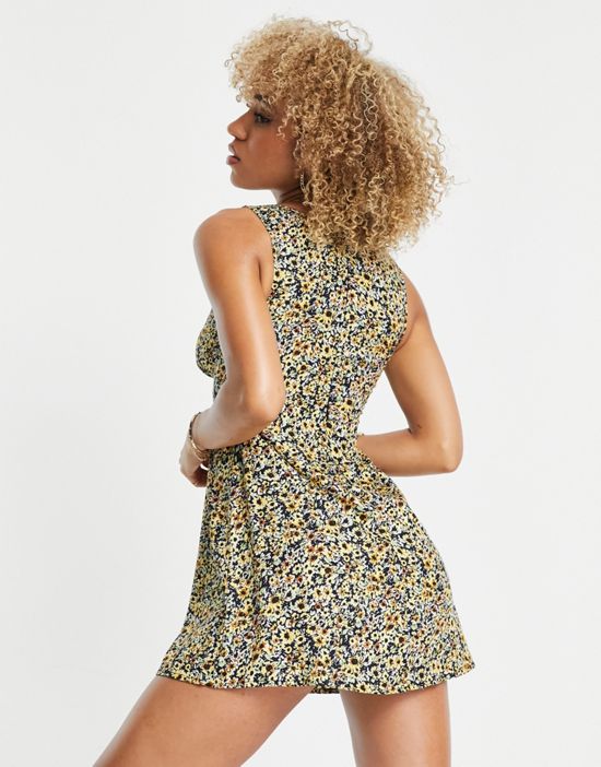 https://images.asos-media.com/products/motel-v-neck-mini-tea-dress-in-grunge-yellow-floral/202388449-3?$n_550w$&wid=550&fit=constrain