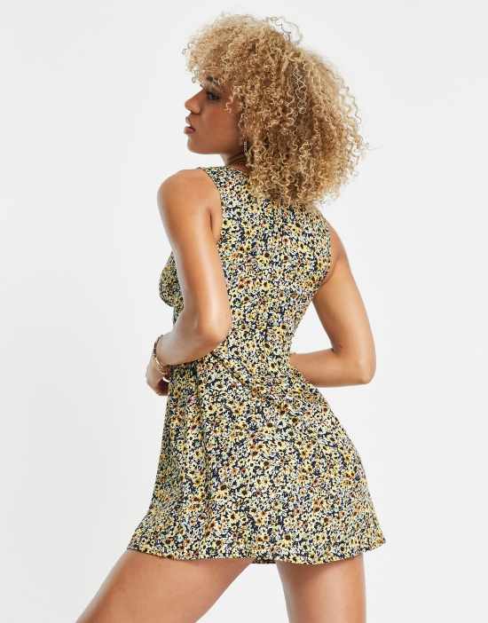 https://images.asos-media.com/products/motel-v-neck-mini-tea-dress-in-grunge-yellow-floral/202388449-3?$n_550w$&wid=550&fit=constrain