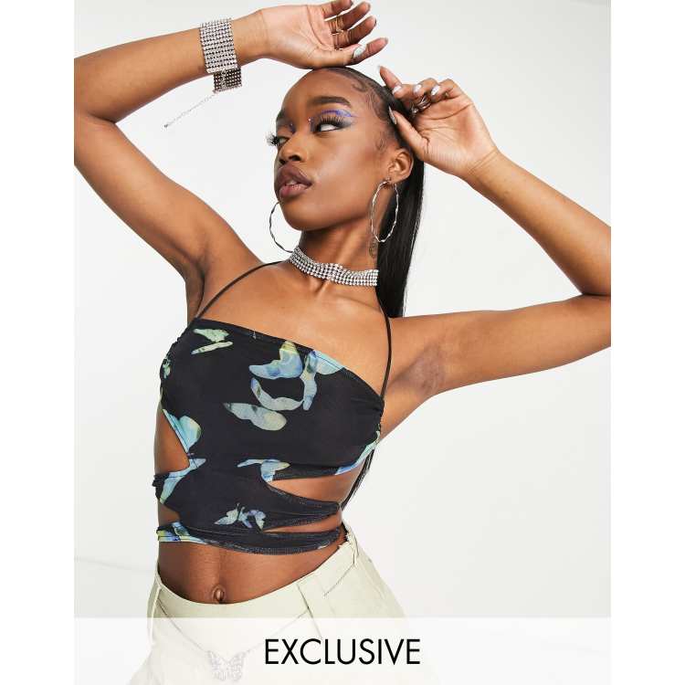 Motel y2k crop top with side cut outs and tie back in blue butterfly print  | ASOS