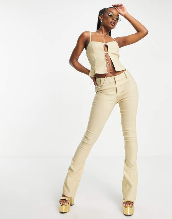 https://images.asos-media.com/products/motel-y2k-low-waist-flare-pants-in-ecru-part-of-a-set/202152987-4?$n_550w$&wid=550&fit=constrain