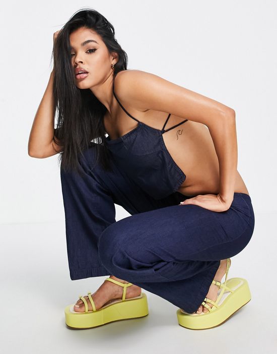 https://images.asos-media.com/products/motel-y2k-strappy-back-cami-top-in-indigo-chambray-part-of-a-set/202629258-4?$n_550w$&wid=550&fit=constrain