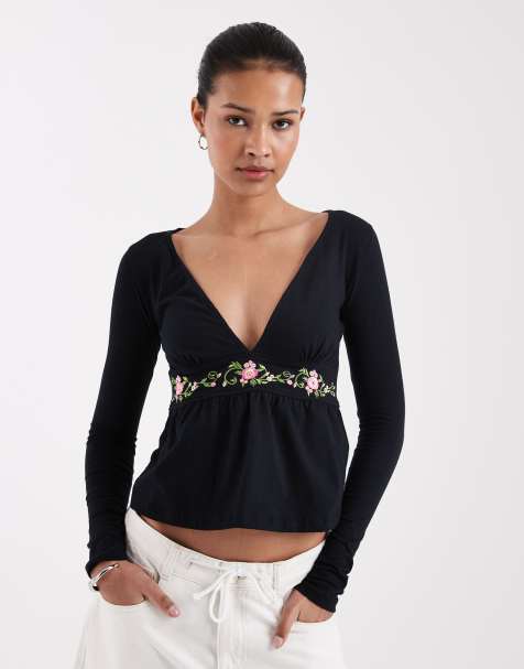 Motel – Yahop – Czarny top z długimi rękawami i głębokim dekoltem w kwiatowy wzór - view 1
