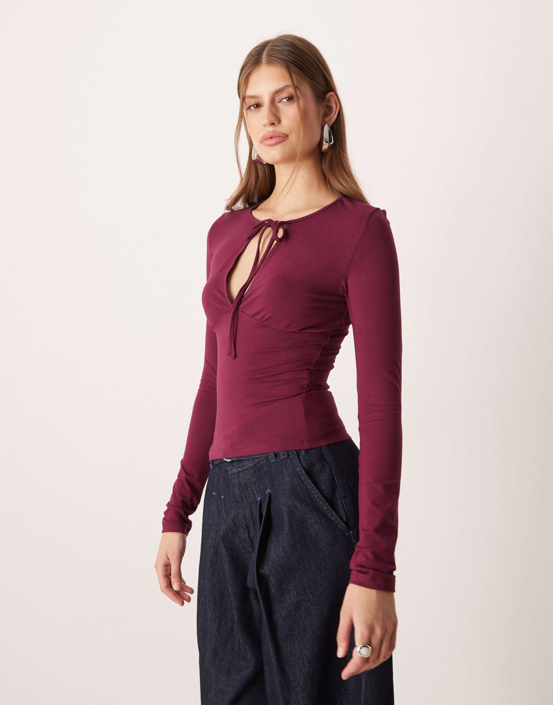 motel yubin long sleeve top with keyhole cut-out in plum