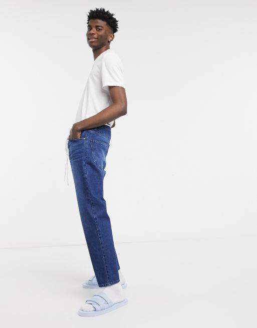 Mørk blåvaskede stive vintagejeans fra ASOS DESIGN