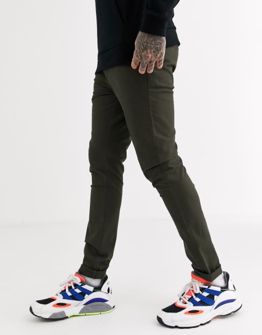 Mørke khaki-farvede chinos i superskinny pasform fra ASOS DESIGN
