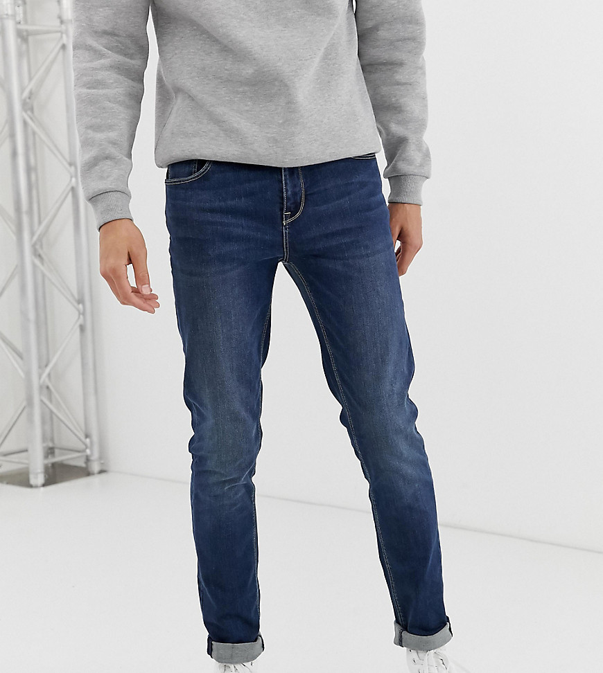 Mørkvaskede skinny jeans fra ASOS DESIGN Tall-Blå