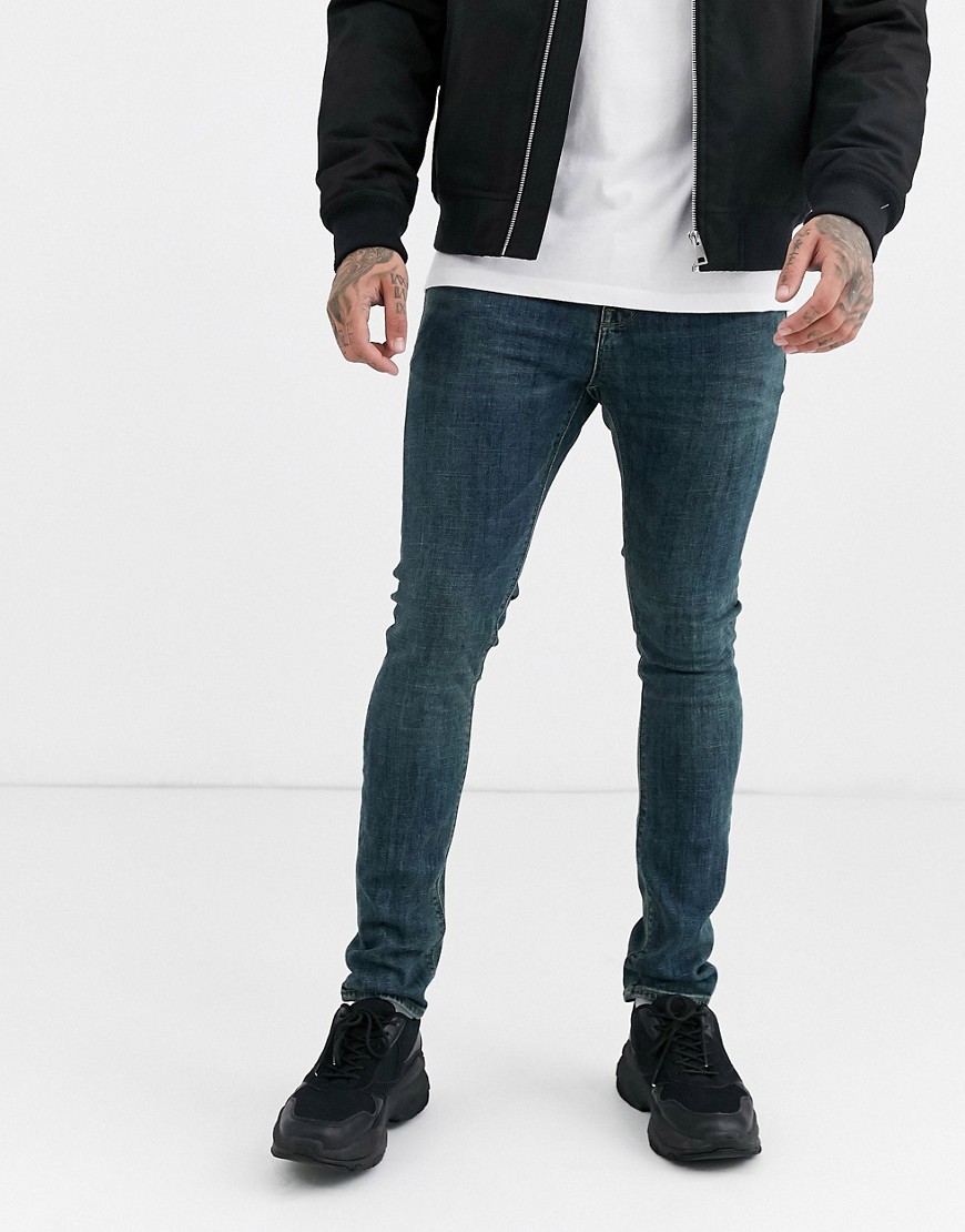 Mørkvaskede vintage super-skinny jeans fra ASOS DESIGN-Blå