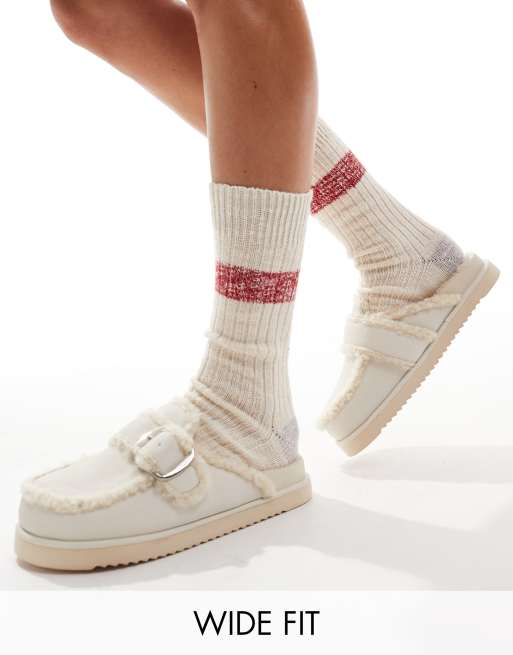 Mules beis de tejido tipo peluche Kylie de RAID Wide Fit
