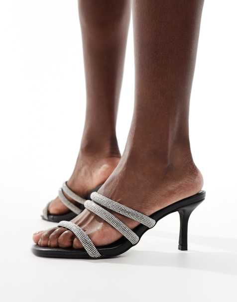 Mules negros de tacón bajo con diseño de correas adornadas de Truffle Collection - view 1