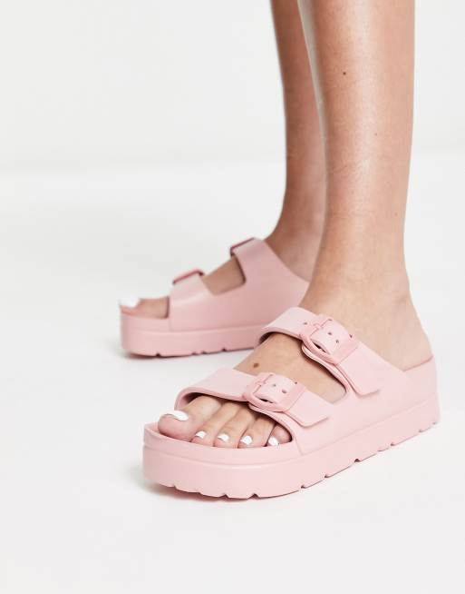 Mules rosas con plataforma plana de goma Fawn de ASOS DESIGN
