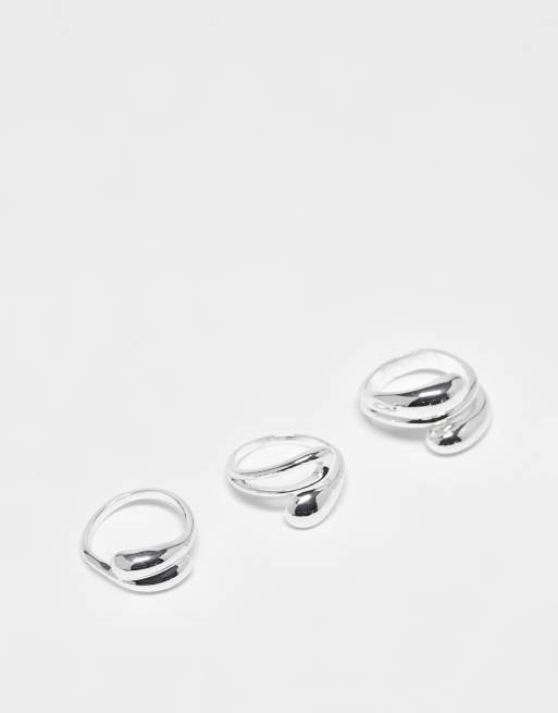 Multipack de anillos plateados con diseños ondulados abombados de ASOS DESIGN Curve