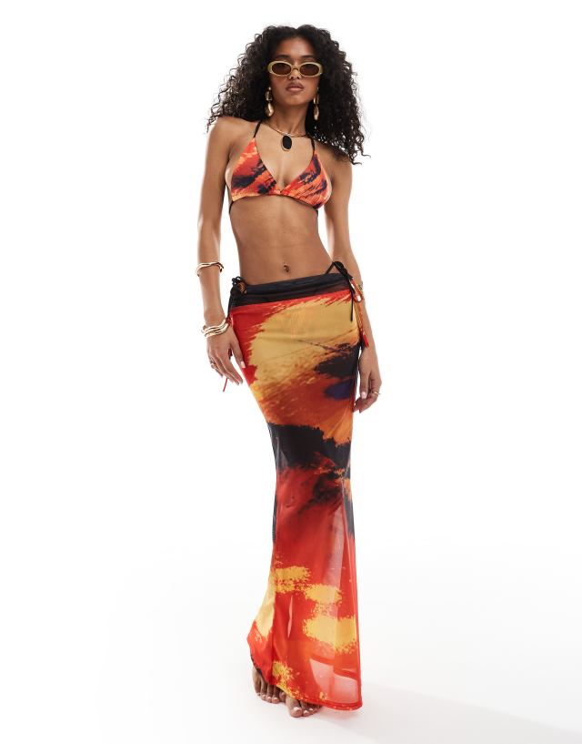 Murci - tie detail bikini set and mesh beach maxi skirt co-ord in red lava print