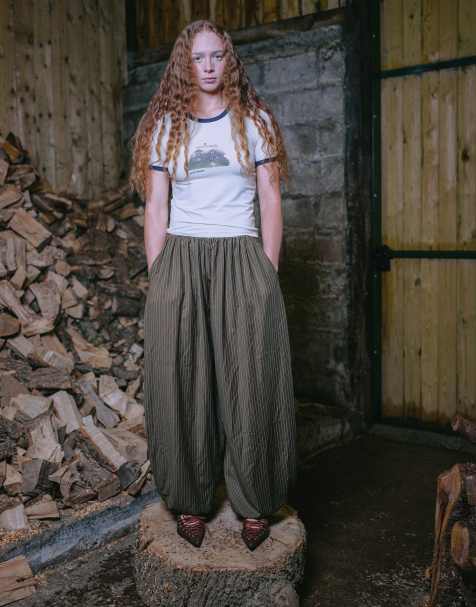 Muse Assembly balloon eva trousers in green pinstripe - view 1