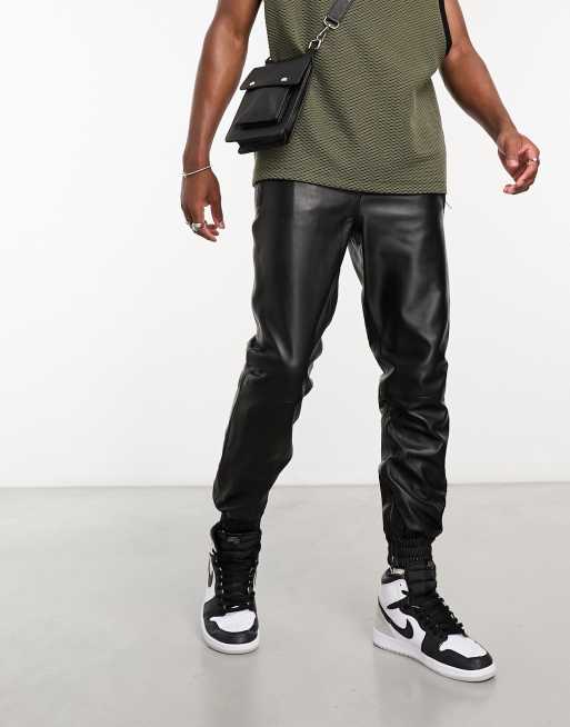 Muubaa - Joggers ampi in pelle con tasche con chiusura a zip