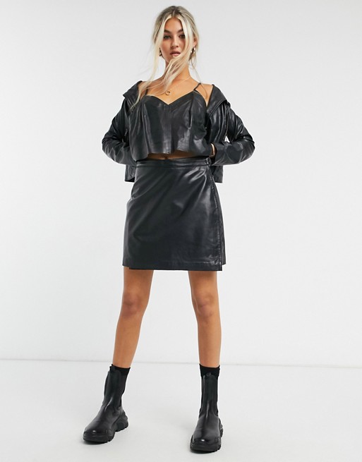 Muubaa wrap front leather mini skirt in black