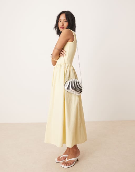 yellow dress with silver accessories How To Accessorize A Yellow Dress  RB Italia Blog