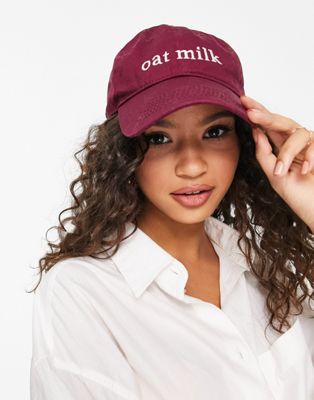 My Accessories London cap in red with 'oat milk' slogan