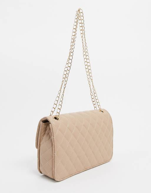 Accessories London Exclusive quilted chain cross body bag in camel | ASOS