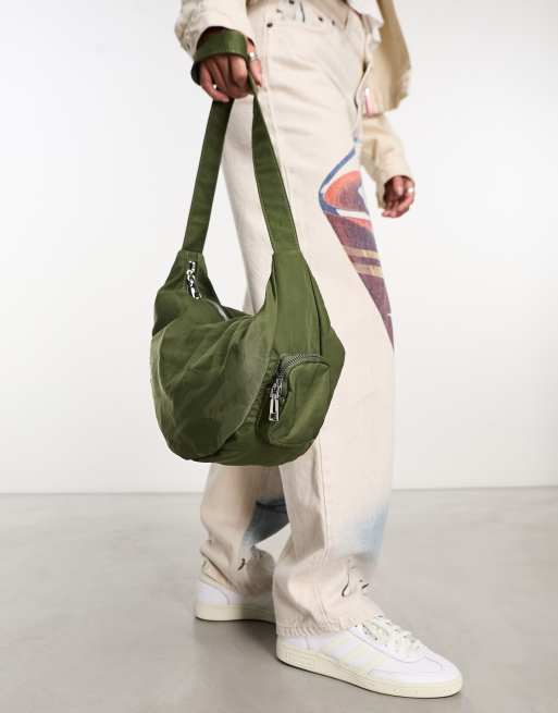 My Accessories London nylon sling bag with pockets in khaki