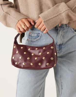 My Accessories - Mit Nieten besetzte Handtasche in Burgunderrot