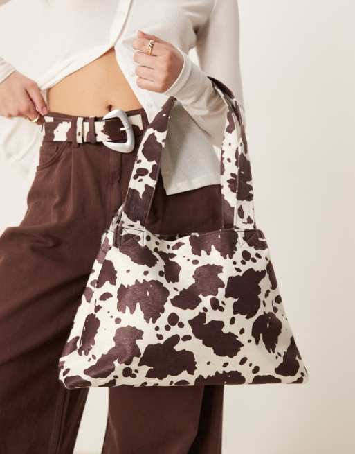 My Accessories Sac porté épaule fuselé à imprimé vache ASOS