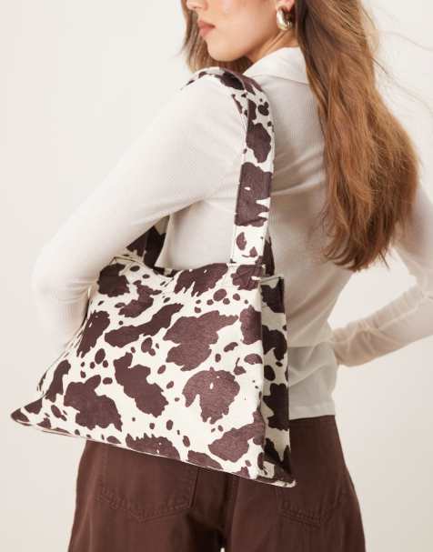 My Accessories tapered shoulder bag in cow print - view 1