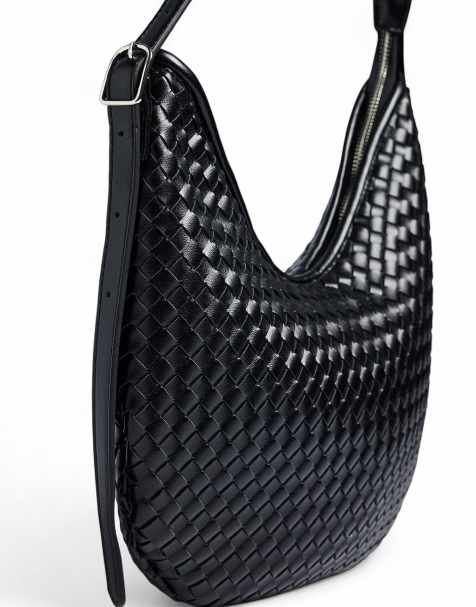 NA-KD – Abgerundete Handtasche in Flechtoptik in Schwarz - view 1