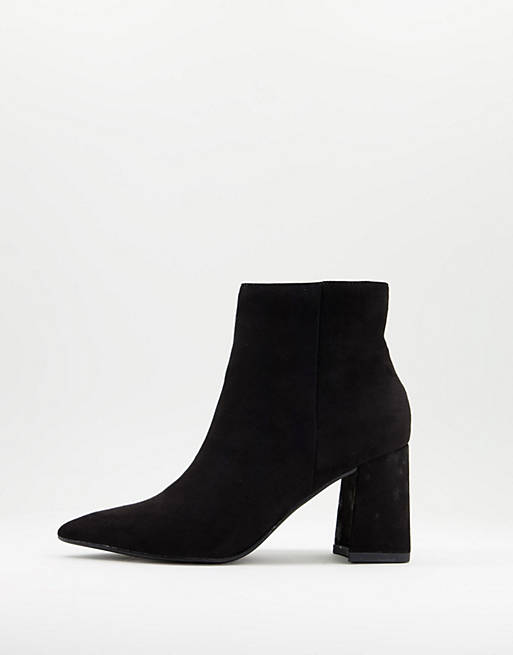 NA-KD basic slanted heel faux suede boots in black