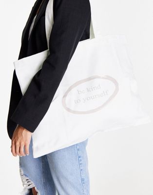 NA-KD be kind to yourself bag in off white