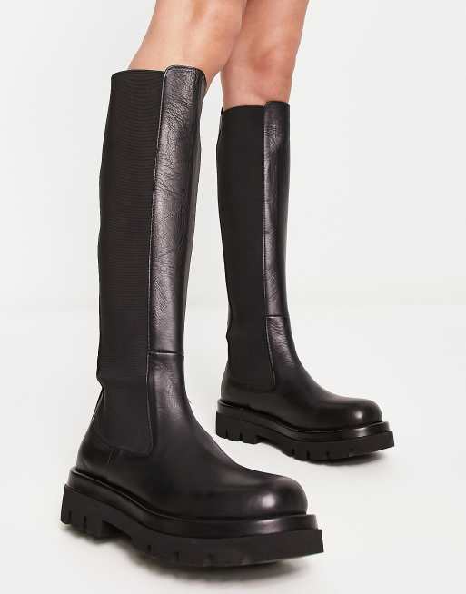 NA-KD Bottines hauteur genou en cuir à semelle chunky Noir ASOS