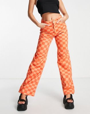 NA-KD checkerboard wide leg jeans in orange