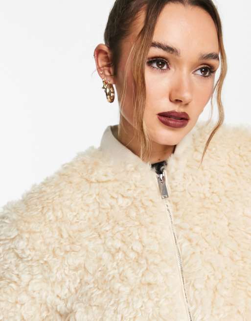 NA-KD faux fur bomber jacket in beige