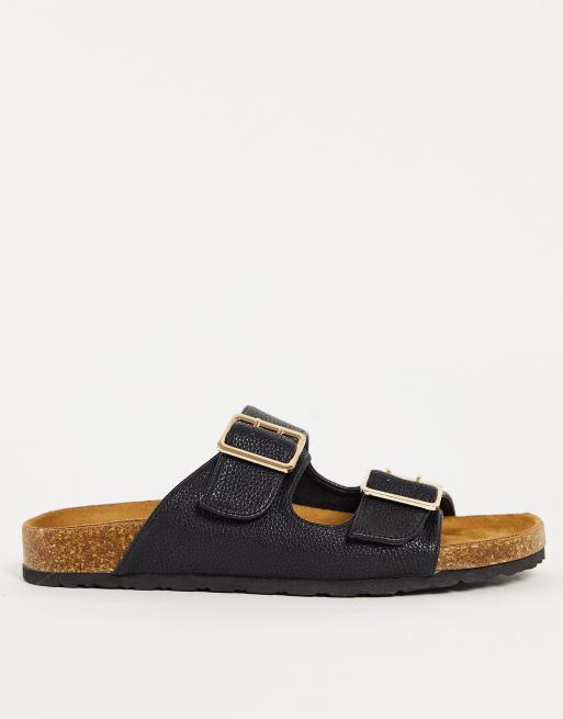 NA-KD – Flache Sandalen in Schwarz mit Schlangenmuster und Schnallen