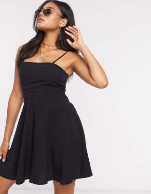 NA-KD flowy mini dress in black | ASOS