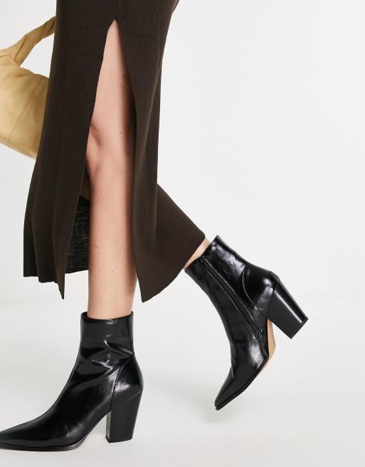 NA-KD heeled Western boots in black | ASOS