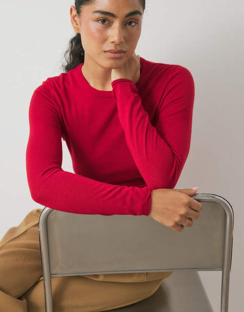 NA-KD Knitted merino wool round neck top in red - view 1