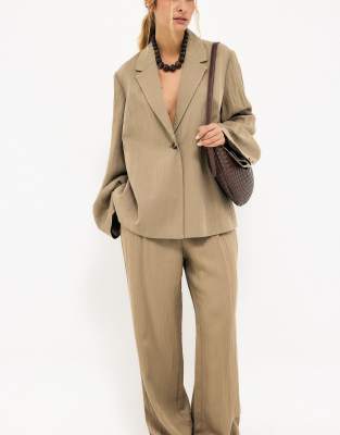 Locker geschnittene Hose aus Lyocell-Mix in Taupe-Braun Braun 36