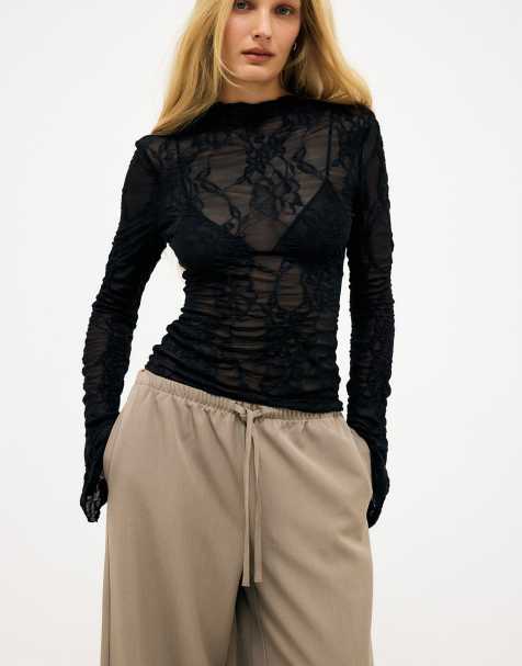 NA-KD Long sleeve lace top in black - view 1