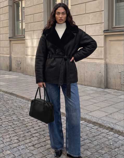 NA-KD Oversized belted bonded jacket in black - view 1