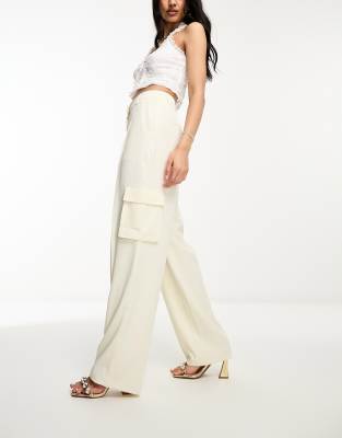 Silk trousers in off-white