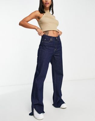 NA-KD raw edge low rise long jeans in dark blue - ASOS Price Checker