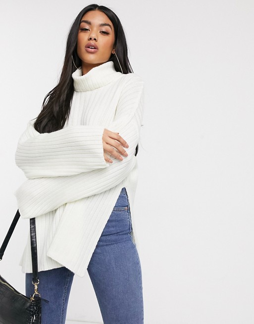 NA-KD ribbed roll neck jumper with side slit in off white