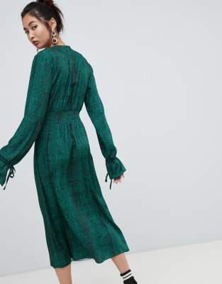 green snake print midi dress