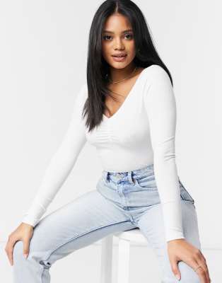 white ruched long sleeve top