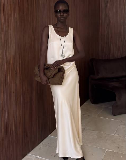 NA-KD Satin maxi skirt in champagne