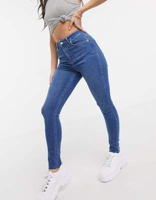 NA-KD Skinny high waist raw hem jeans 