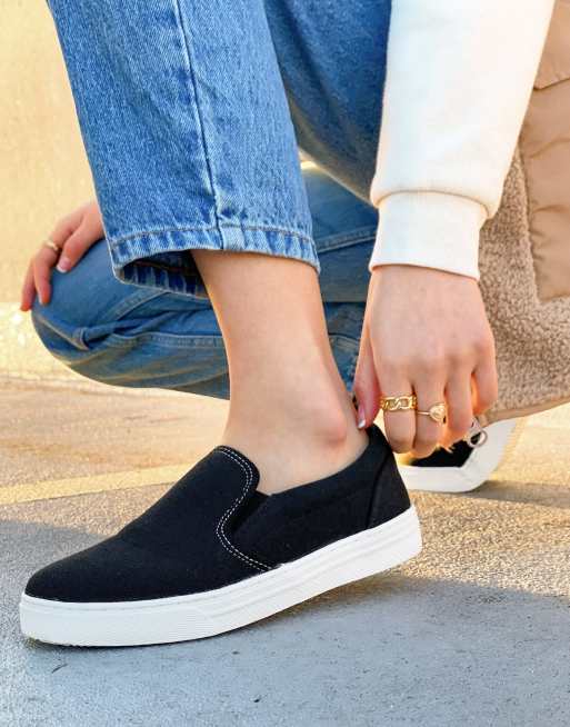 NA KD slip on plimsolls in black ASOS